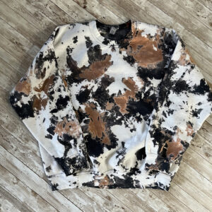 Image of a sweatshirt bleached to look like an acid wash or cowhide look